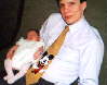 With daddy on April 2nd. Do you like his tie?