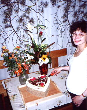 Daniela cutting the cake